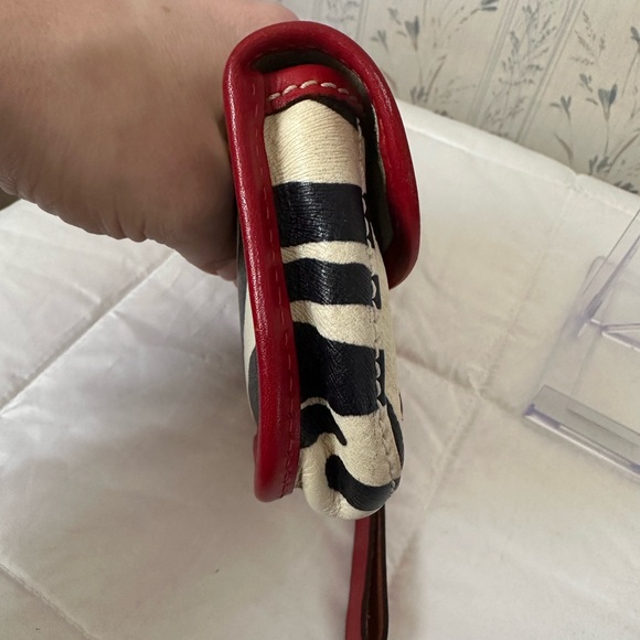 Dooney & Bourke Leather Zebra Wristlet with Red Trim - Picture 4 of 13